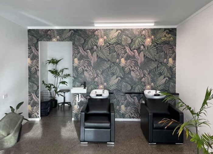 Printed feature wallpaper in a salon